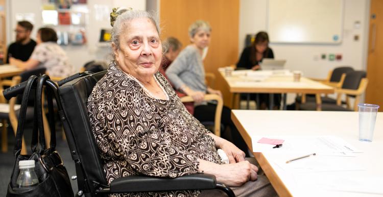 A lady in an electric wheelchair