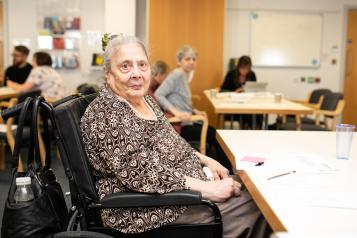 A lady in an electric wheelchair