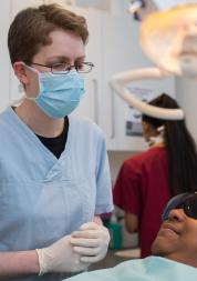 dentist about to operate on a patient, NHS dentist, dentistry, dental appointment